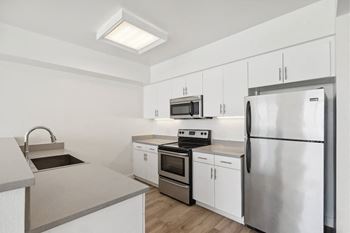 Gourmet kitchen with white or espresso cabinets
